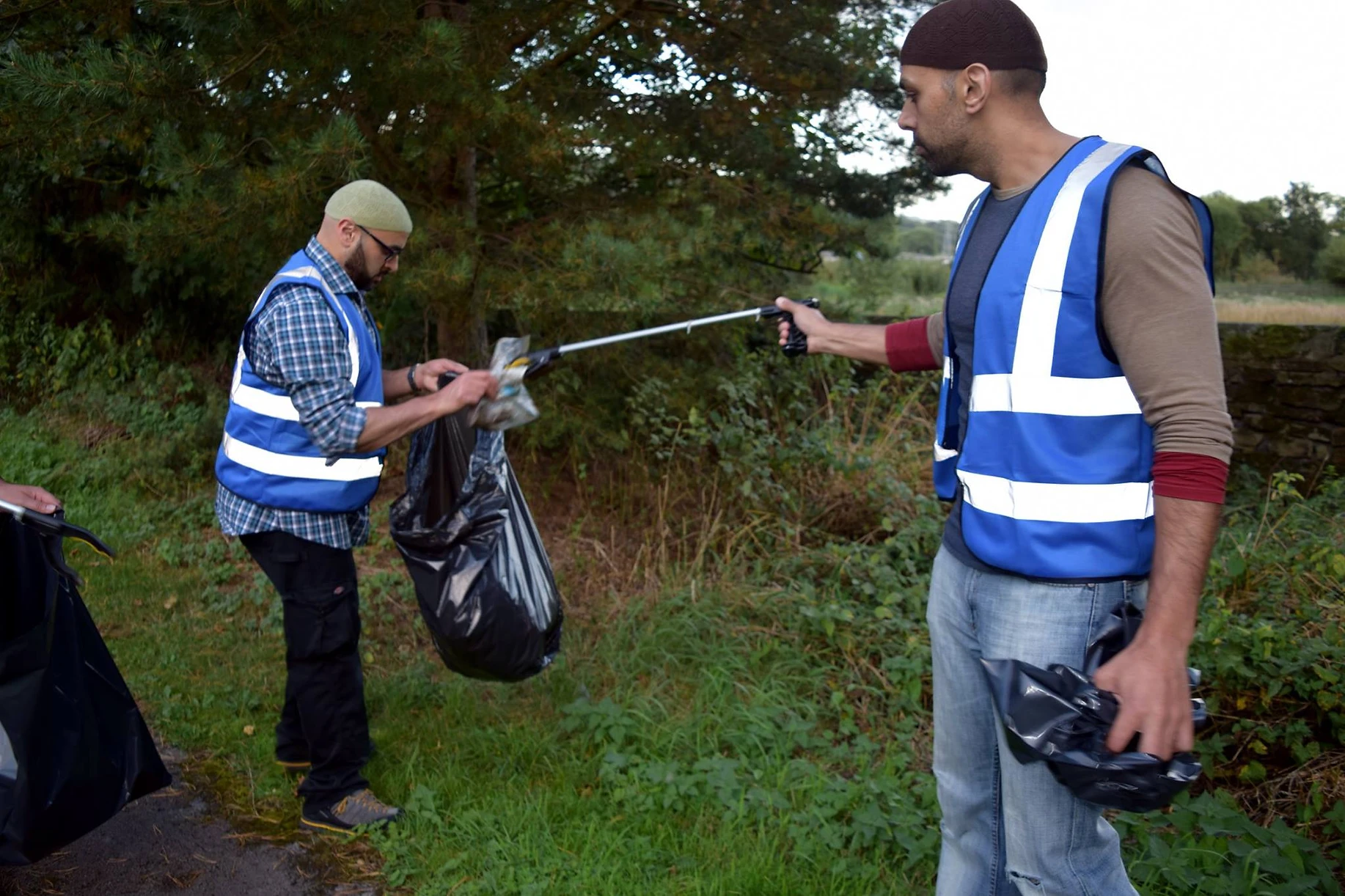 People cleaning streets